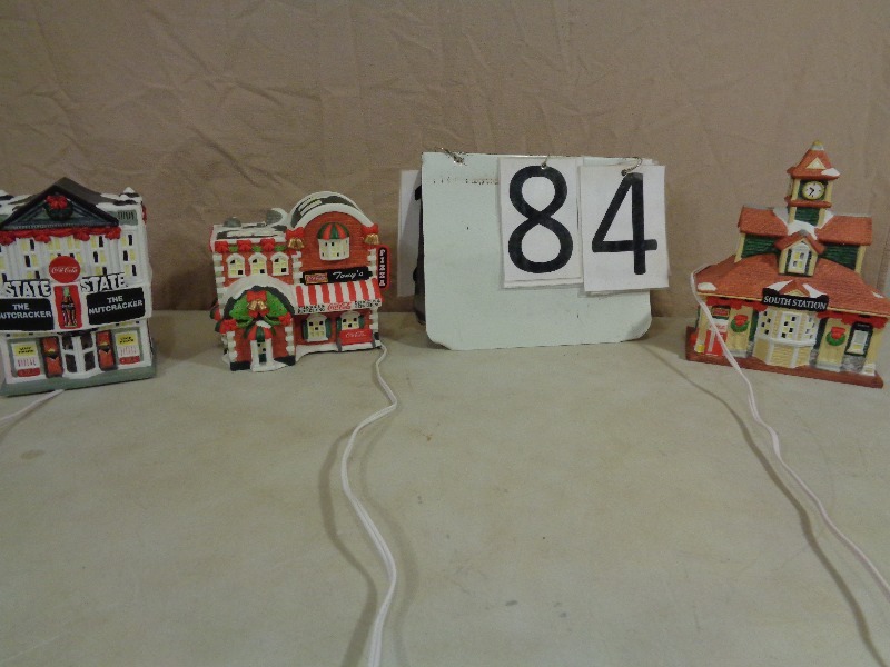 lot 84 image: Coca Cola Light Up Porcelain Christmas Collector Houses