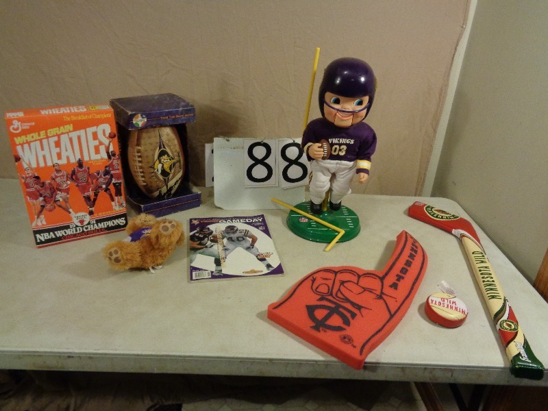 lot 88 image: Minnesota Vikings, Twins, Wild, and Chicago Bulls Memorbilia.