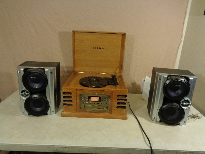 lot 98 image: Crosley Multi Function Stereo and Sony Speakers