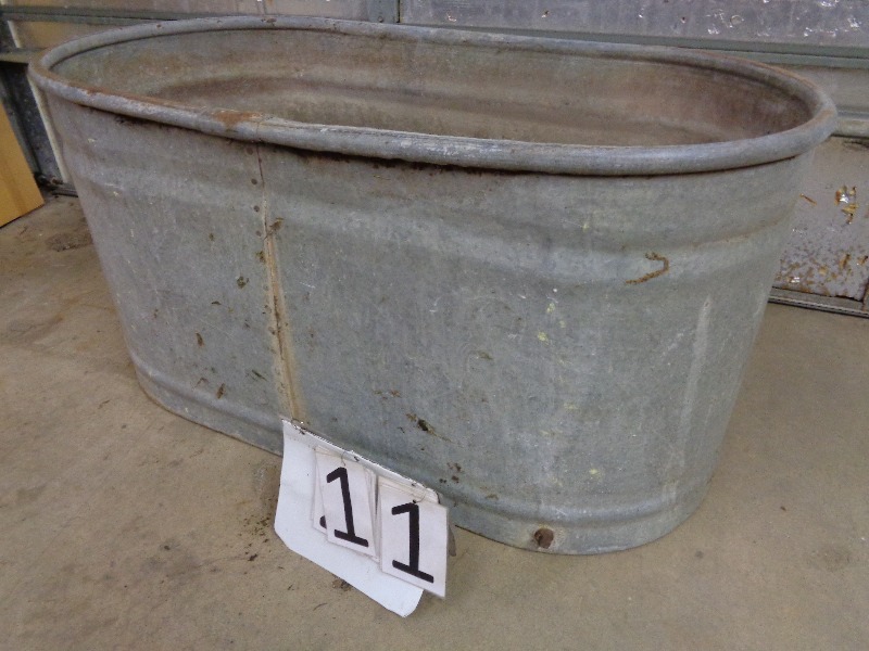 lot 11 image: Big Galvanized StockWater Tank
