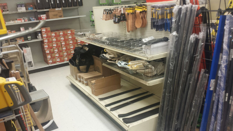 Pegboard displays with shelving.