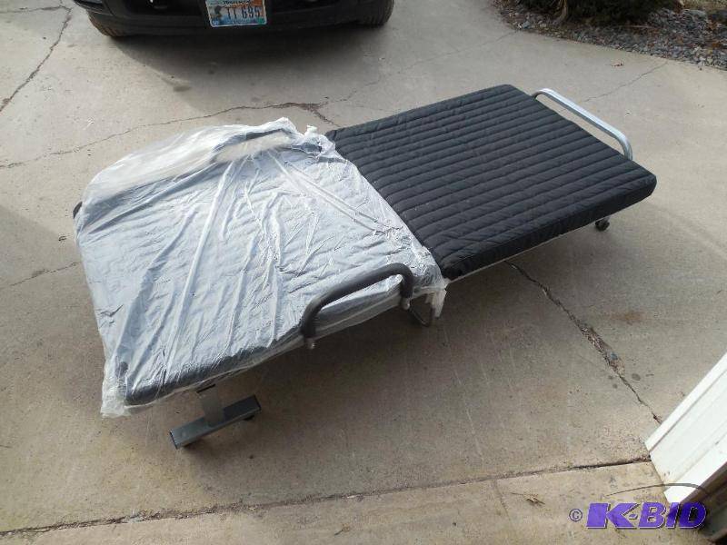 lot 36-COPY image: Compact Folding Rollaway BedLoveseat