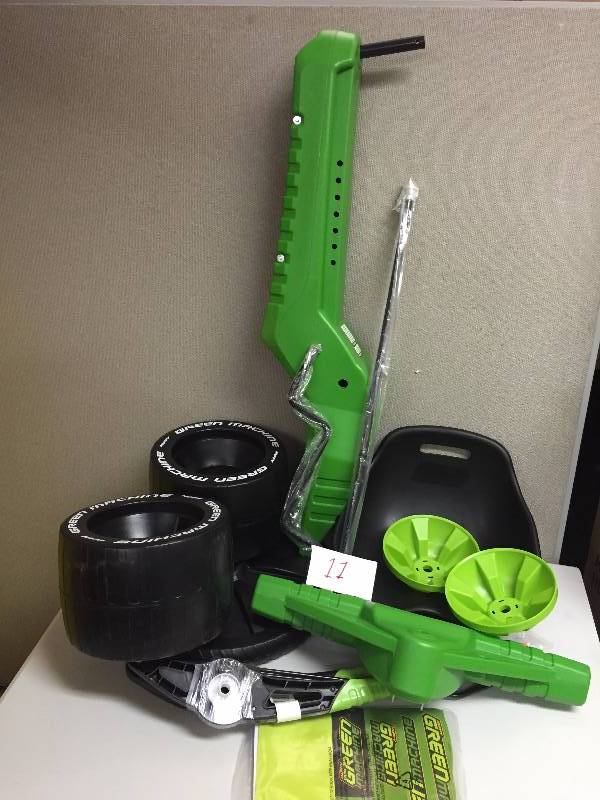 lot 11 image: Huffy Green Machine Toy Bike