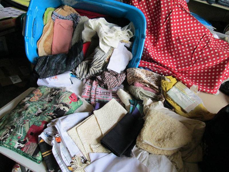 Large bin of assorted linens...