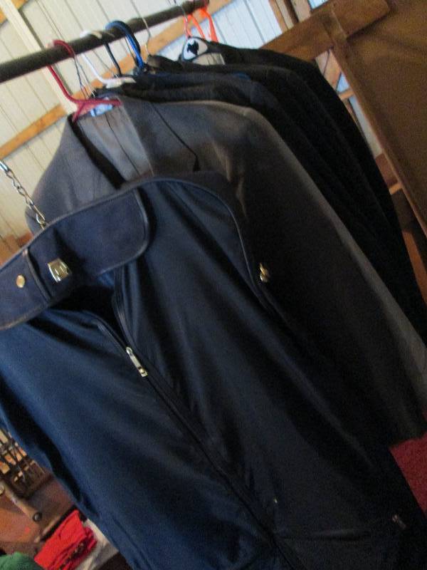 Lot of suit coats and a suit bag...