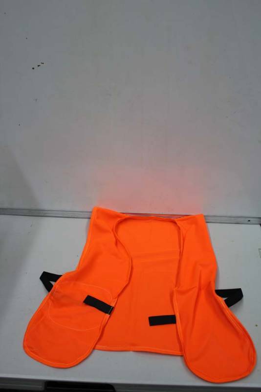 lot 4 image: Packable Blaze Orange Hunting Vests Box of 50