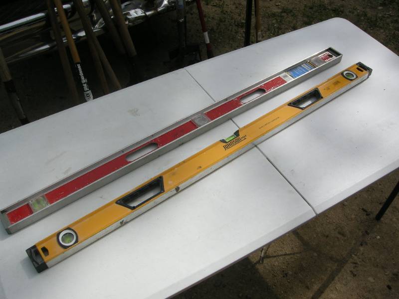 lot 61 image: Two 4 aluminum levels