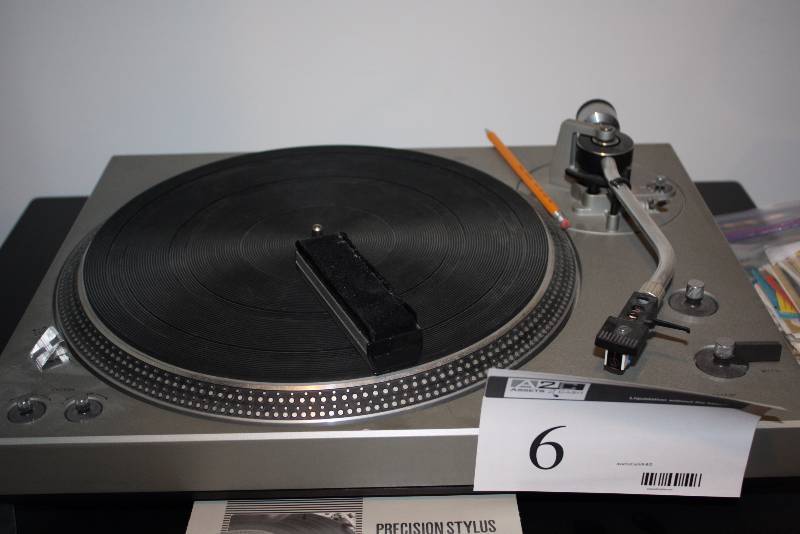 lot 6 image: Technics By Panasonic Record Player Model SL-1400 110120220240V 5060Hz.