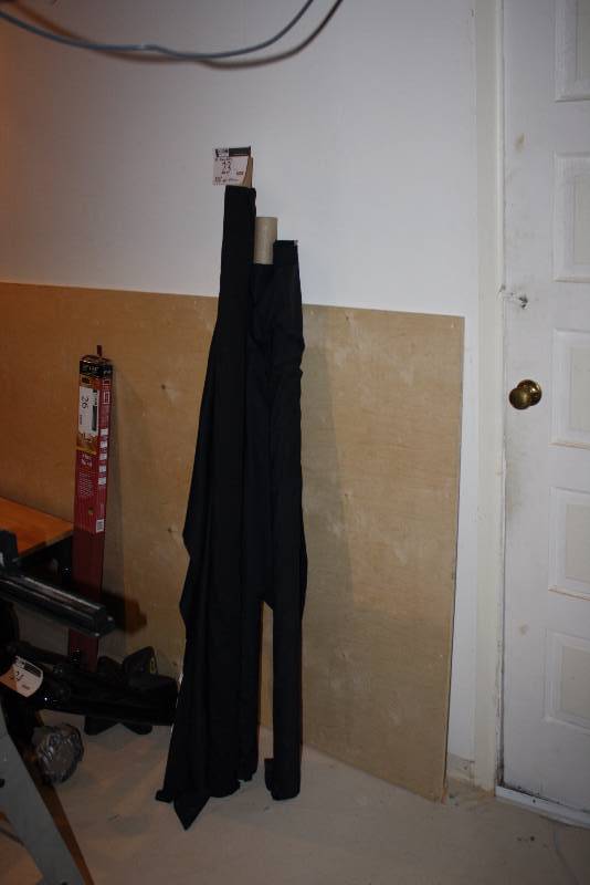 lot 23 image: Lot of (4) Fabric Rolls Black (3) White (1) Black Rolls Are Velvet.