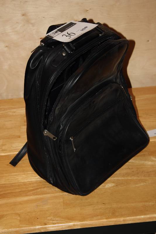 lot 36 image: Leather Style Back-Pack wWheels & Roller Handle Black.