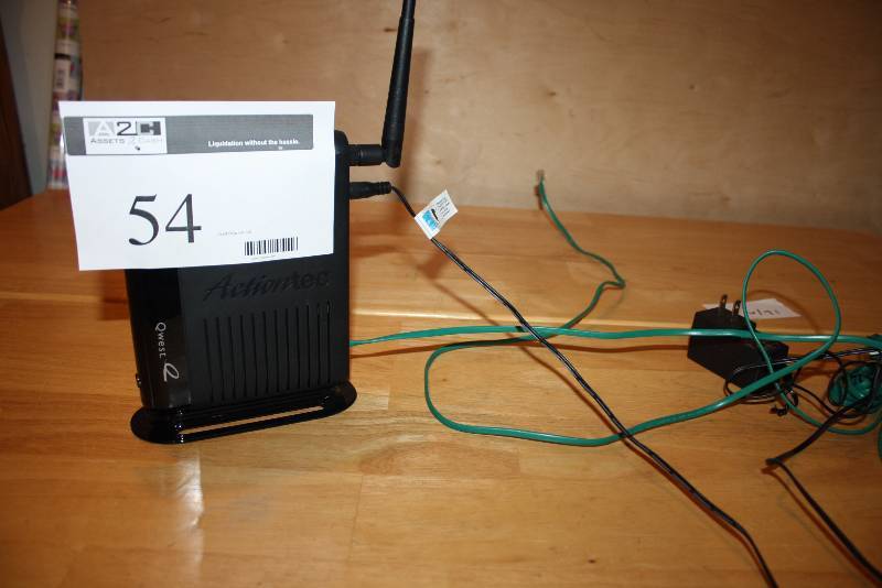 lot 54 image: Qwest Actiontec Personal Modem wCords.