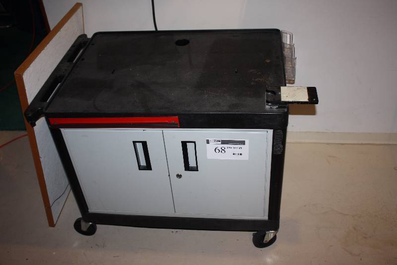 lot 68 image: Work Cabinet wLocking Double Doors & Wheels Handle BlackGray 24 x 38 x 27 Includes Contents.