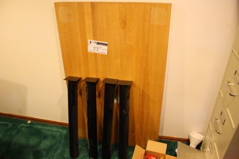 lot 73 image: Lot of (5) Including Wooden Table Top, 30 x 48 Black Chairs wSpindle Backings, 17 x  17 x 36 Table Legs Included.
