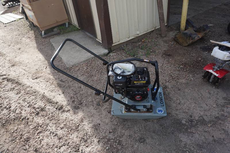 lot 34 image: Loncin Model LC100 Walk Behind Power Vibrating Plate Compactor
