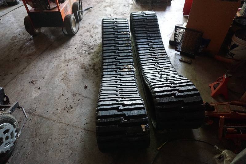 lot 41 image: Cat Brand 15 Wide Skid Loader Rubber Tracks Brand New