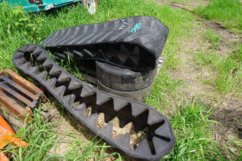 lot 44 image: Over Tire Mount Bobcat Skid Loader Skid Steer Rubber Tracks