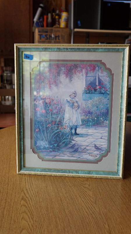 lot 86 image: Child Holding Cat on Stone Patio Framed Print