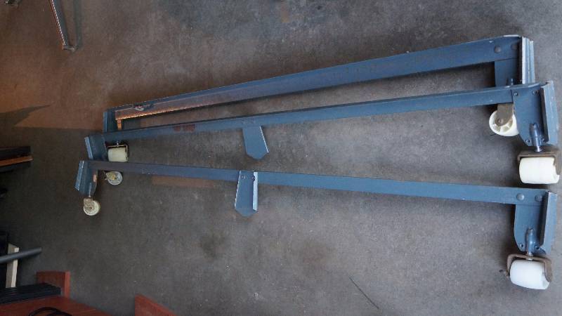 lot 157 image: Metal Bed Frame On Wheels - Full Size