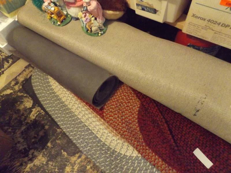 Rugs and suitcase