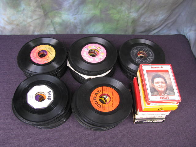 large lot of 45 records and several 8 track tapes