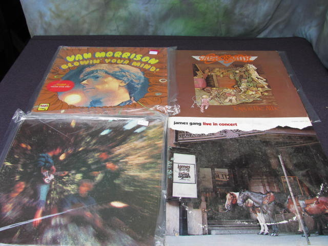 12 vintage rock albums and 9 eight track tapes