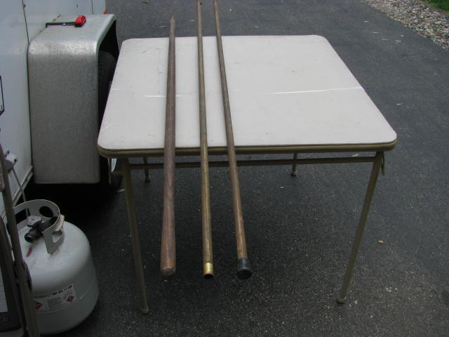 Three long poles