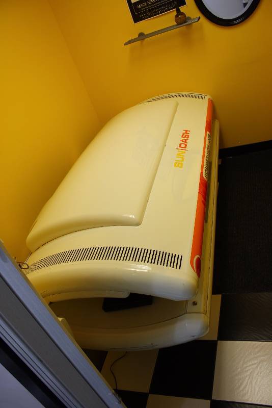 lot 14 image: Room Lot Including Sun Dash Competition 232 Tanning Booth 5126 Hours Canopy Style Curved WCords Dimensions Mirror, 26 x 20.5, Tanning Bed 83 x 44 x 35 Decorative Floor RunnerRug, 84 x 24 Glass Shelf 25 x 8
