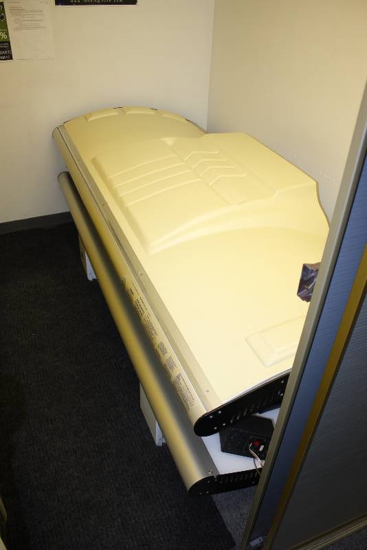 lot 19 image: Room Lot Including Puretan California 30 Tanning Bed 4620W 7264.62.1 Hours Canopy Style Curved WCords Dimensions Tanning Bed 89 x 35 x33 Wooden Shelf 24 x 7 Wall Mount Garbage Can 14 x 7 x4 Speakers, 5.5 x 3.5 (2) Rug 89 x 26.