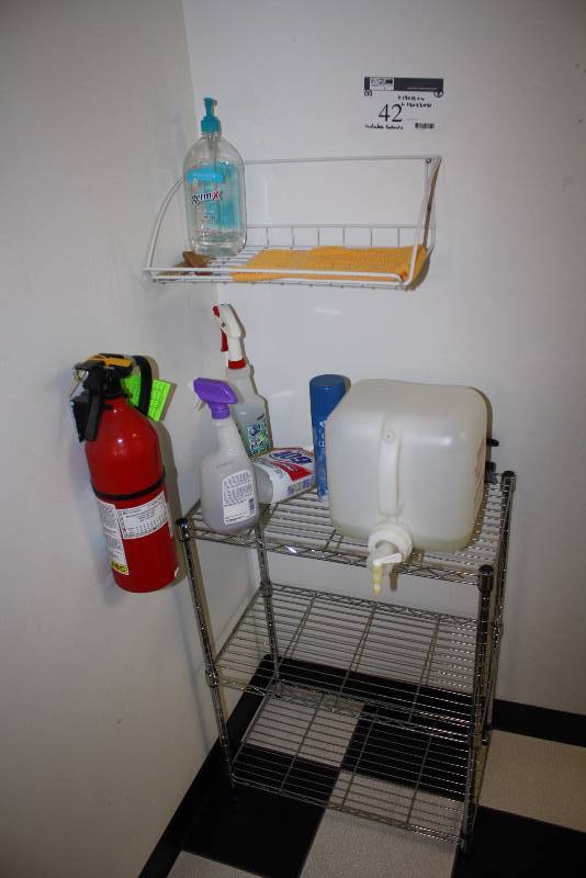 lot 42 image: Shelf Lot Of (2) Including Metal Shelving Unit Wall Mounted Shelving Unit Fire Extinguisher And More 19 x 12 x 6 13 x 23 x 31 Includes Contents.