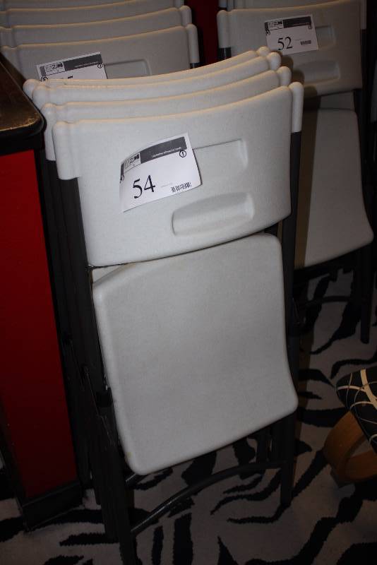 lot 54 image: Lot of (4) Plastic Folding Chairs wWhite Seats & Black Frames.