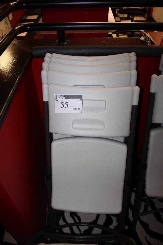 lot 55 image: Lot of (4) Plastic Folding Chairs wWhite Seats & Black Frames.