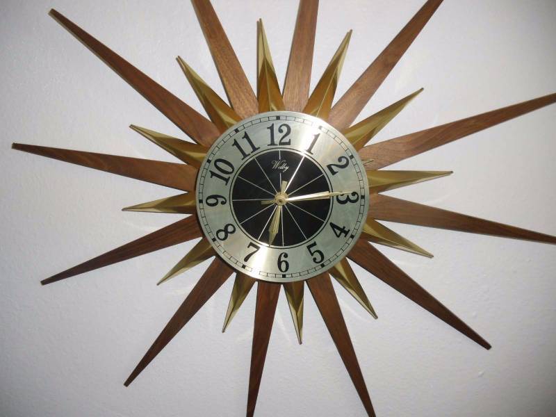 lot 1 image: Mid-Century Welby STARBURST Wall Clock Atomic Age Teak Working Condition.