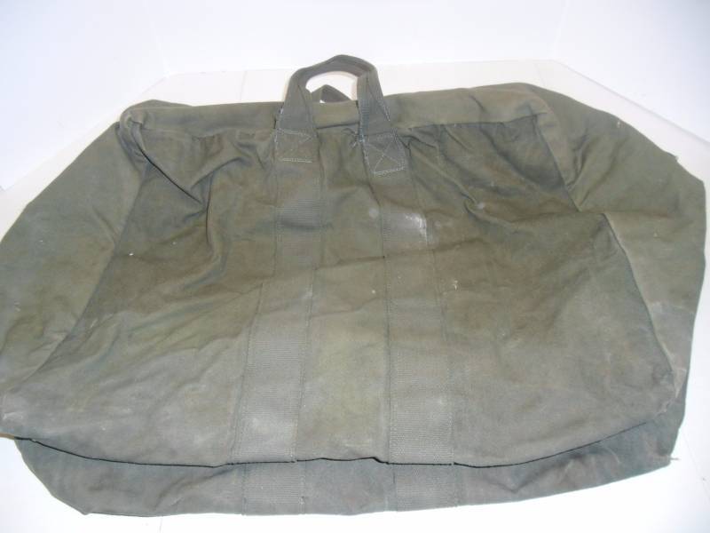 lot 8 image: Vietnam Era Navy Lt.CDR Travel Bag, Bauer Survival Vests