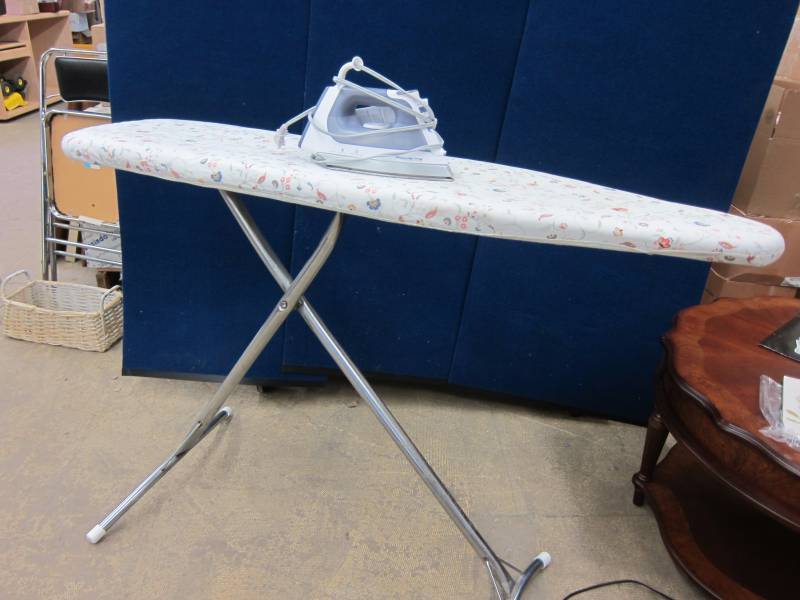 lot 23 image: Rowenta Professional Iron and Ironing Board