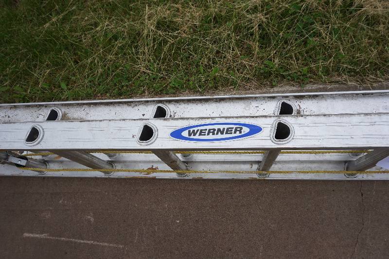lot 12 image: Werner Model D1224-2 24 Aluminum Extension Ladder