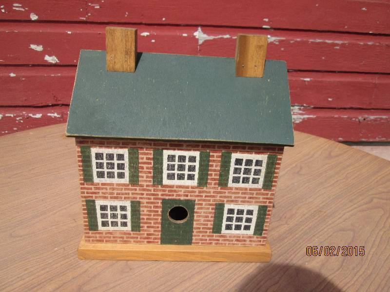lot 93 image: Brick look bird house....