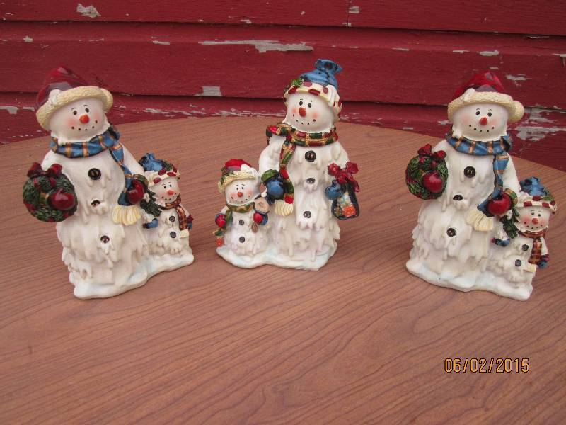 lot 121 image: Trio of resin snowmen...