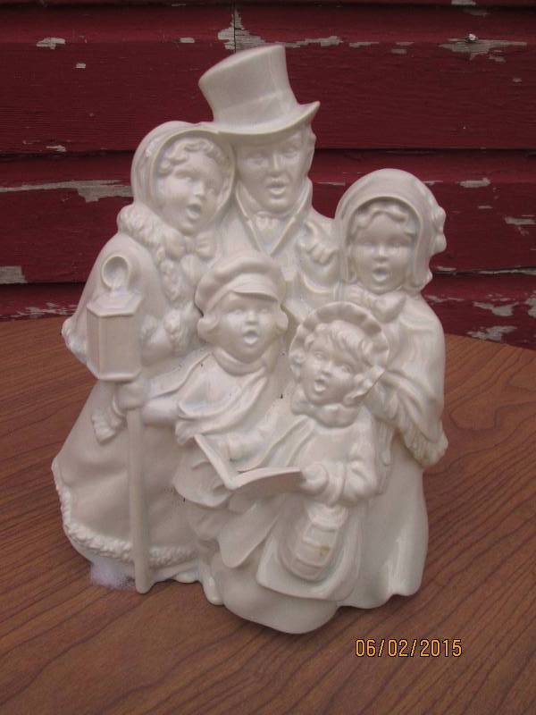 lot 123 image: Porcelain statue of Christmas carol...