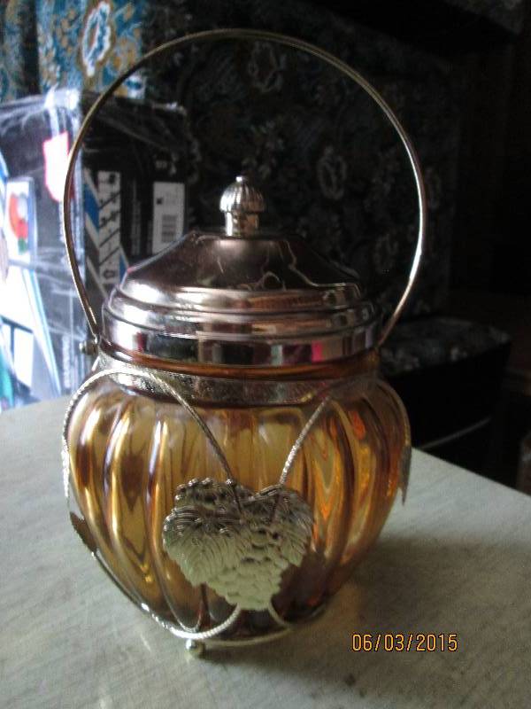 lot 150 image: Vintage pumpkin shaped amber glass ...