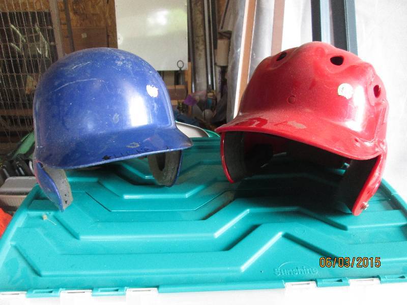 Pair of baseball helmets. Size smal...