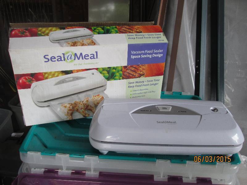 Seal-a-Meal vacu-seal appliance. In...