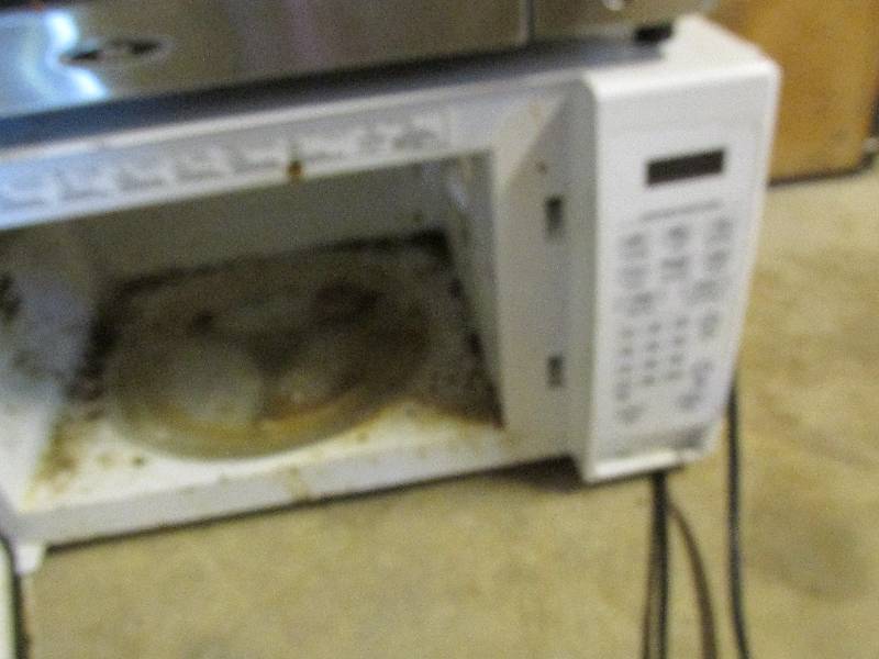 GE Microwave and Oster toaster oven...