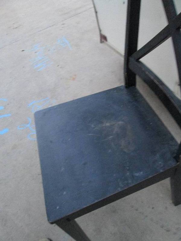 Black distressed finish wood chair...