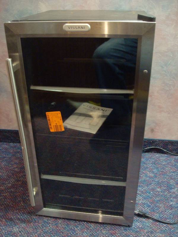 lot 16 image: Wine Refrigerator, Does Not Cool Below 50 Degrees