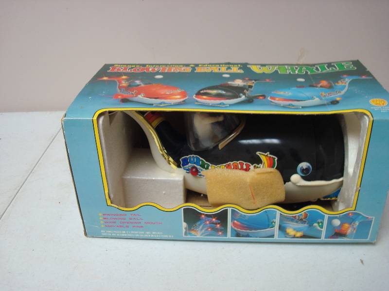 lot 64 image: Blowing Ball Whale, Wear To Box