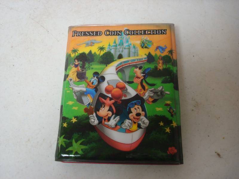 lot 94 image: Disney Pressed Coin Book With Some Coins