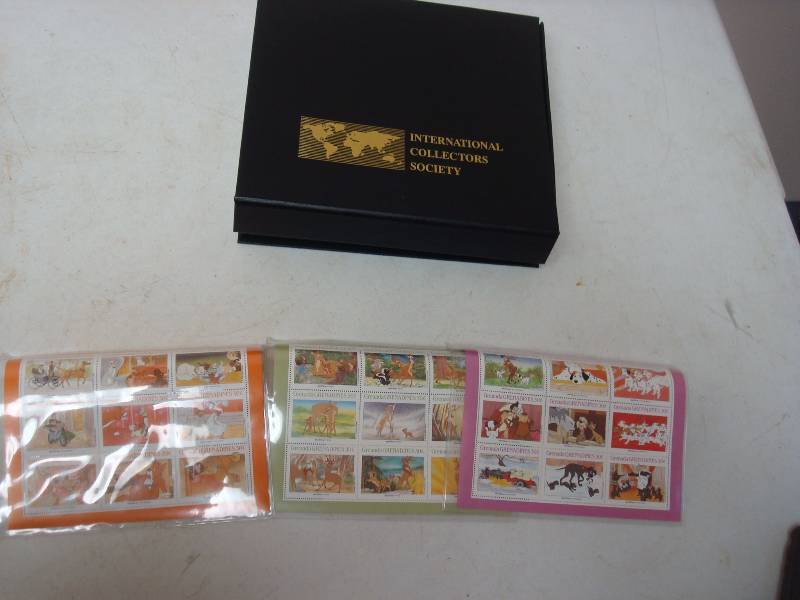 lot 98 image: Lot of Disney Stamps, Have Bend To Them