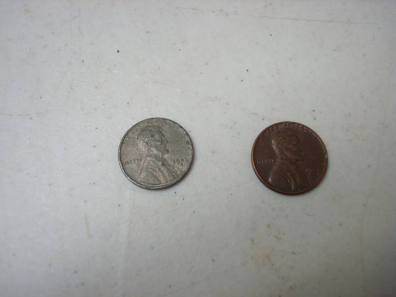 lot 132 image: Pair Of Wheat Pennies, One Is Steel