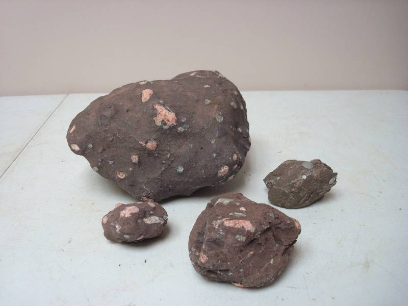 lot 134 image: Lot Of Rocks, Maybe Amygdule