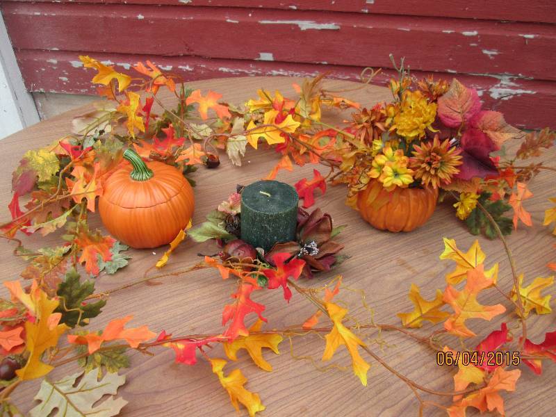 Fall pumpkin planters with several ...